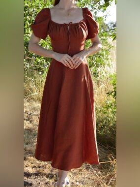 Linen milkmaid dress in rust color